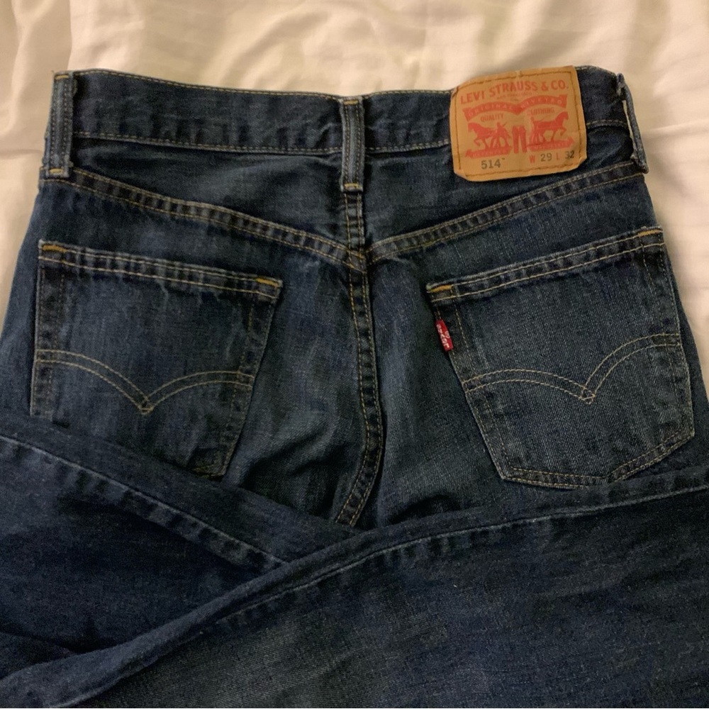 Vintage Levi’s dark wash mid rise straight leg jeans